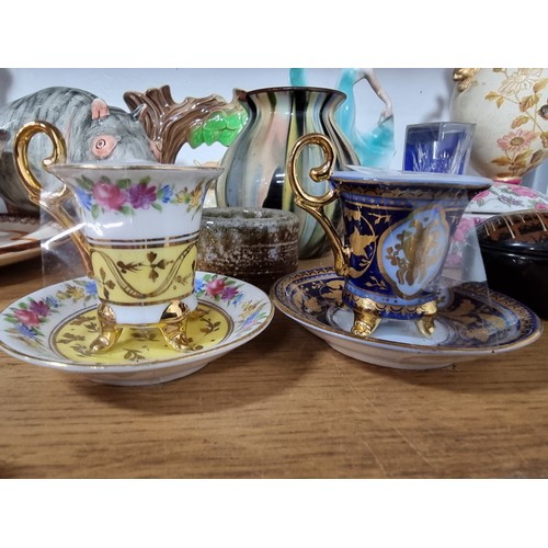 340 - A shelf full of good quality collectables including an interesting antique blue and white Chinese va... 