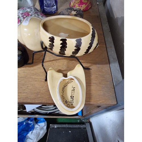 340 - A shelf full of good quality collectables including an interesting antique blue and white Chinese va... 