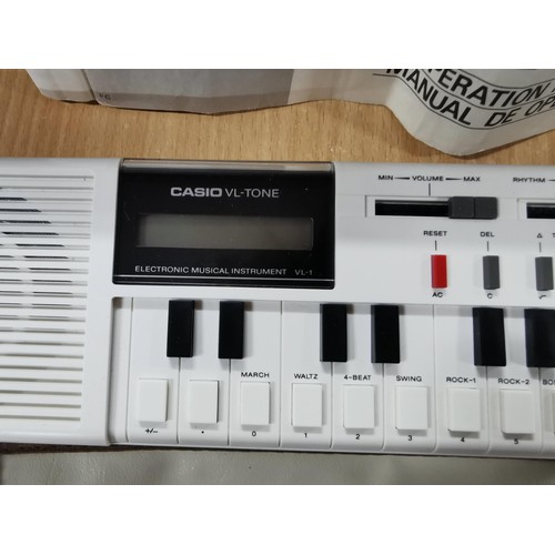 Cased Casio VL-Tone VL-1 electronic musical instrument