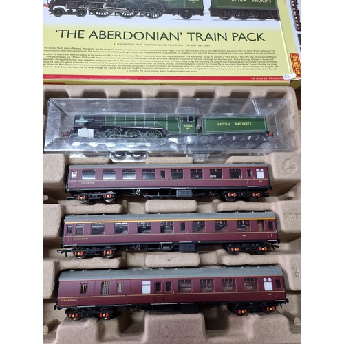 124 - A Honby R3828 Aberdonian train pack class A1 Tornado  locomotive plus 3 coaches, only been used for ... 