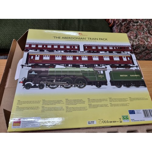 124 - A Honby R3828 Aberdonian train pack class A1 Tornado  locomotive plus 3 coaches, only been used for ... 