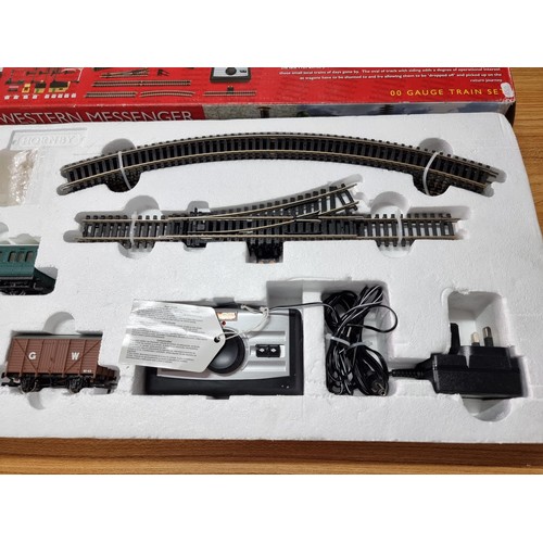 126 - A boxed Hornby R1142 Western Messenger train set to include an extra wagon, mostly complete just mis... 