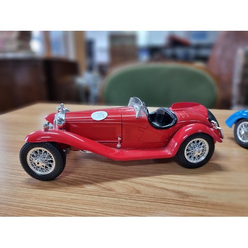 134 - 2 large diecast scale model cars by Burago, both are 1/18 scale, to include a Bugatti type 59 and a ... 