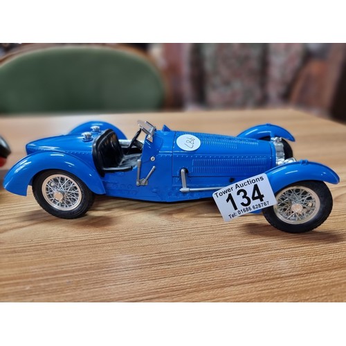 134 - 2 large diecast scale model cars by Burago, both are 1/18 scale, to include a Bugatti type 59 and a ... 