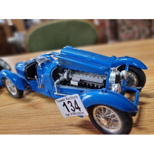 134 - 2 large diecast scale model cars by Burago, both are 1/18 scale, to include a Bugatti type 59 and a ... 