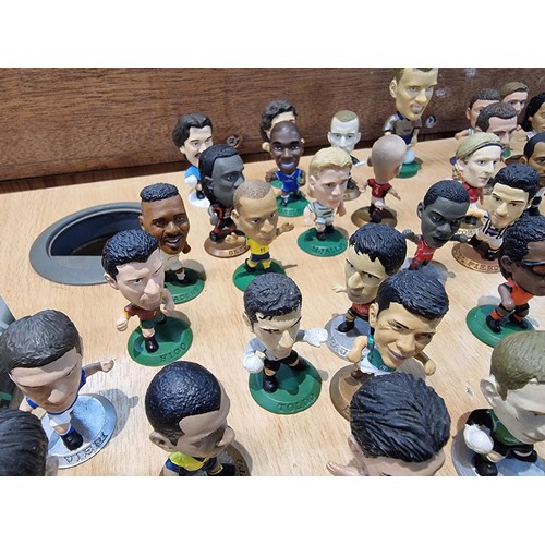 139 - A large collection of approx 55x miniature football figurines by Corinthian  dated between 1999-2004... 