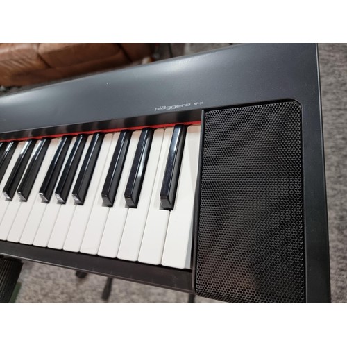 142 - A Yamaha Piaggero MP/31 76 springback key keyboard with fold up keyboard stand, in full working orde... 