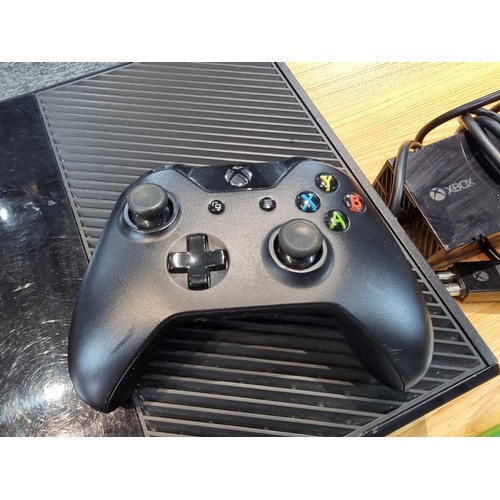 143 - An Xbox one gaming console with a 1TB hard drive complete with 5 good games, controller, Xbox connec... 