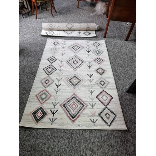 147 - 2x as new rugs by habitat with a geometric design both are 120 x 170cm, both are matching.