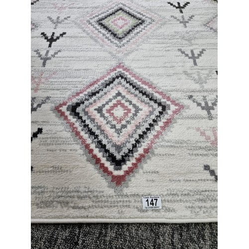 147 - 2x as new rugs by habitat with a geometric design both are 120 x 170cm, both are matching.