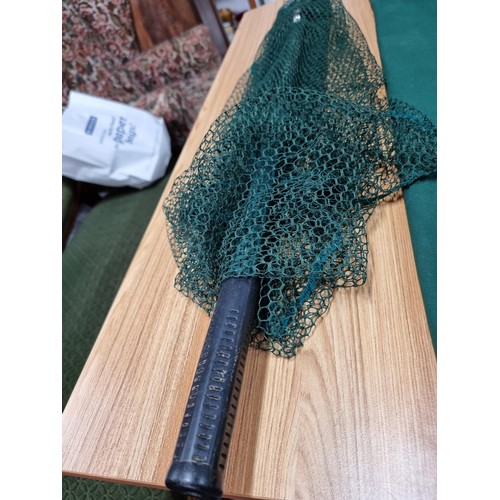 157 - A cased telescopic landing net in excellent clean condition.