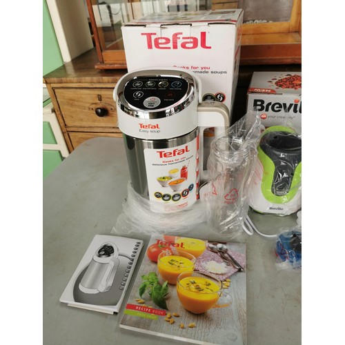 12 - A quantity of electrical kitchen items as new in boxes inc a Tefal soup maker, Morphy Richards Spira... 