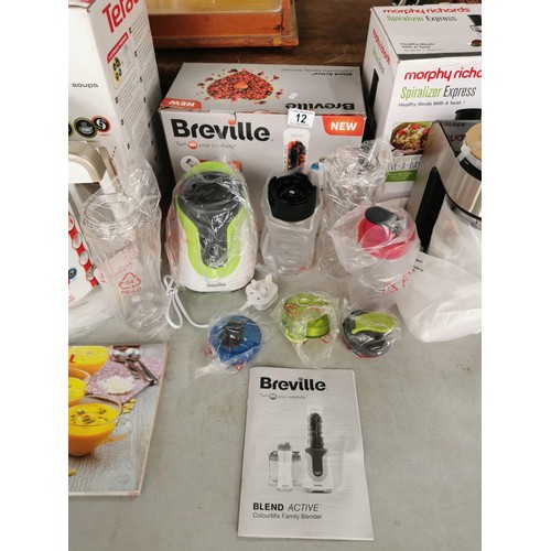 12 - A quantity of electrical kitchen items as new in boxes inc a Tefal soup maker, Morphy Richards Spira... 