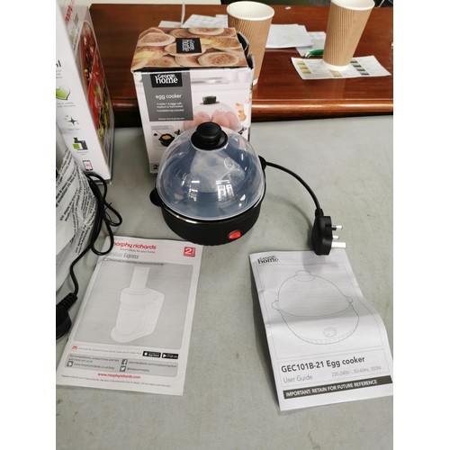 12 - A quantity of electrical kitchen items as new in boxes inc a Tefal soup maker, Morphy Richards Spira... 