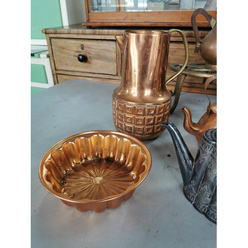 13 - Large quantity of copper items to inc jugs, jelly molds, teapots along with a brass trivet, epns tea... 