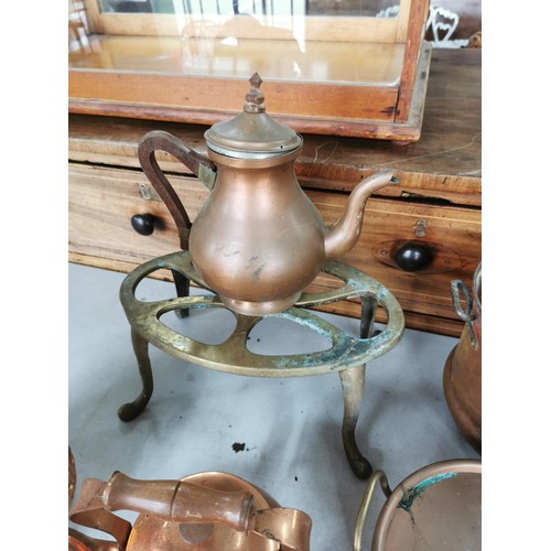 13 - Large quantity of copper items to inc jugs, jelly molds, teapots along with a brass trivet, epns tea... 