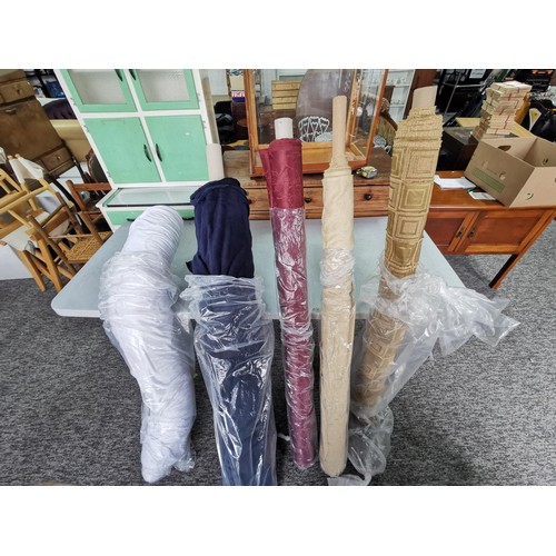 27 - 2x large rolls of fabric 1 is dark blue and the other is white along with 3x small rolls of fabric i... 