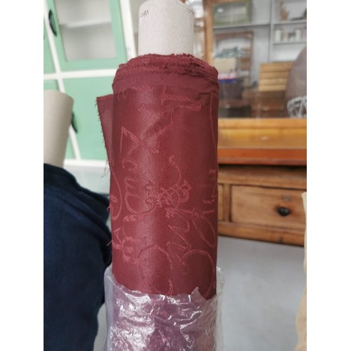 27 - 2x large rolls of fabric 1 is dark blue and the other is white along with 3x small rolls of fabric i... 