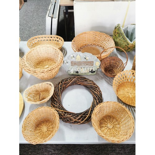 37 - Large quantity of wicker baskets, bamboo plate, graduated basket set, along with 2 fleece lined hot ... 