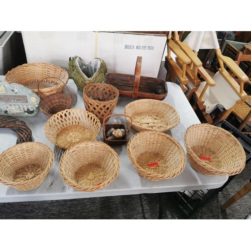 37 - Large quantity of wicker baskets, bamboo plate, graduated basket set, along with 2 fleece lined hot ... 