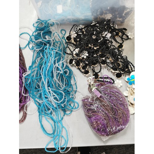 41 - 2x crates containing a large quantity of costume jewellery inc beaded necklaces, floral necklaces et... 