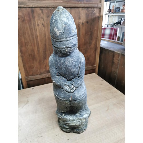 49 - A rude stoneware figure of a policeman, stands at 61cm high