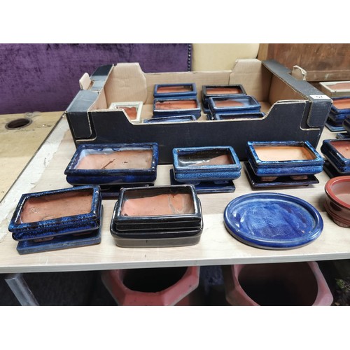 57 - Large collection of terracotta dark and light blue, Green and Cream, bonsai planters, most are with ... 