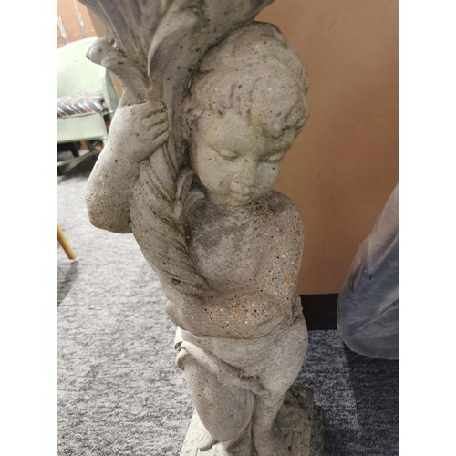 105 - Large stoneware cherub formed garden statue, stands at 82cm high