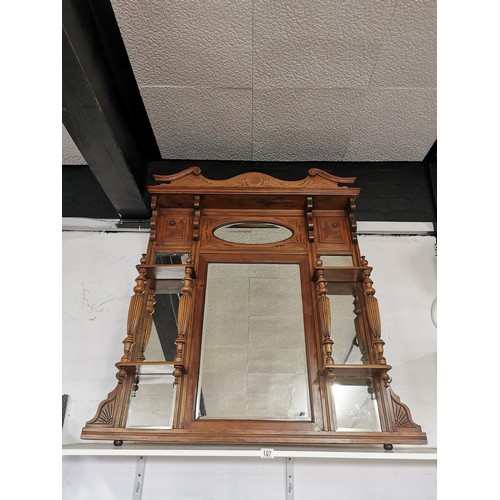 107 - Good quality oak well detailed mirrored over mantel with floral carving decoration and 4x shelves he... 