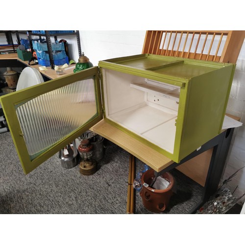 108 - Green vintage Remploy kitchen cupboard with ribbed glass revealing a single shelf 39cm high, 59cm lo... 