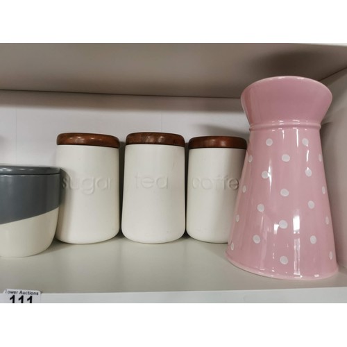 111 - Quantity of ceramic kitchen storage pots inc Sugar, Coffee, Tea, other storage jars along with a lar... 