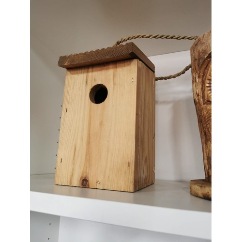 113 - 2x log formed owl carved bird feeders along with a wooden bird box 22cm high 15cm diameter