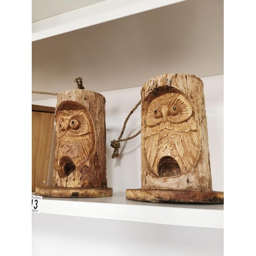 113 - 2x log formed owl carved bird feeders along with a wooden bird box 22cm high 15cm diameter