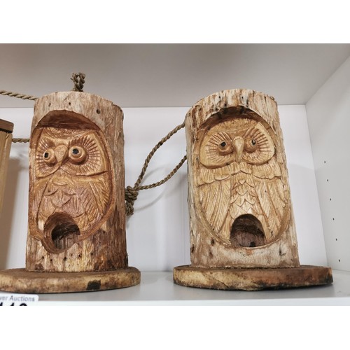 113 - 2x log formed owl carved bird feeders along with a wooden bird box 22cm high 15cm diameter