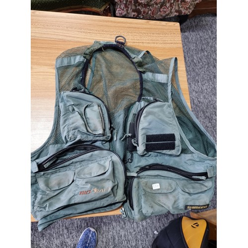 163 - 2x gents fishing vests along with a Ron Thompson fish bait bum bag tray. The vests are size medium a... 