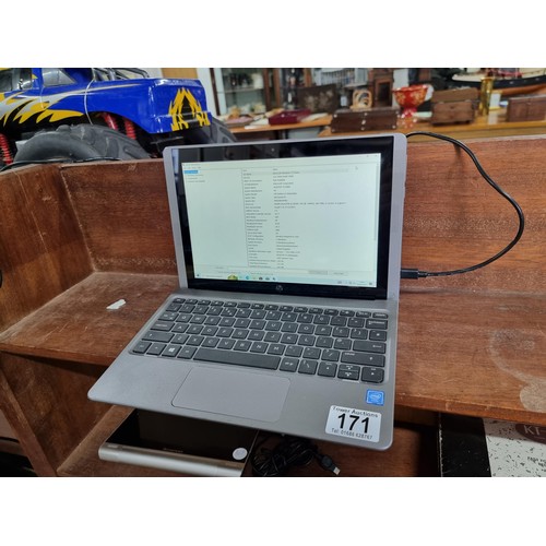 171 - An HP detachable laptop model TPN-1122 features a screen which detaches from the keyboard so can be ... 