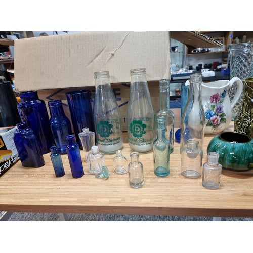 189 - A large job lot of collectables and odds in 3 boxes to include collectable glass bottles, scent bott... 