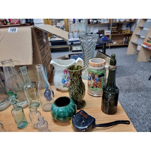 189 - A large job lot of collectables and odds in 3 boxes to include collectable glass bottles, scent bott... 