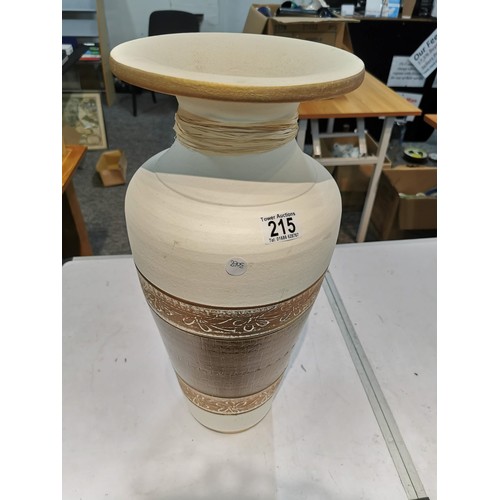 215 - Large cream and gold coloured tall floor standing vase in good order, height 53cm high