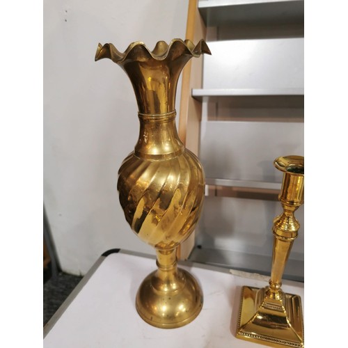 218 - Quantity of brass ware inc pair of matching candle sticks brass vase and large heavy duty brass key ... 