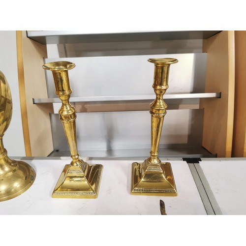 218 - Quantity of brass ware inc pair of matching candle sticks brass vase and large heavy duty brass key ... 