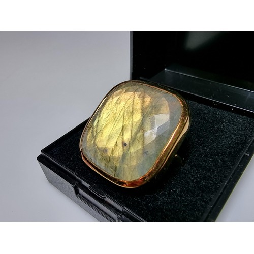 288 - Designer Signed impressive gold plate on 925 silver dress ring, inset with a large faceted Labradori... 