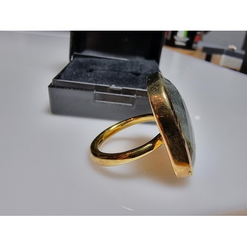 288 - Designer Signed impressive gold plate on 925 silver dress ring, inset with a large faceted Labradori... 