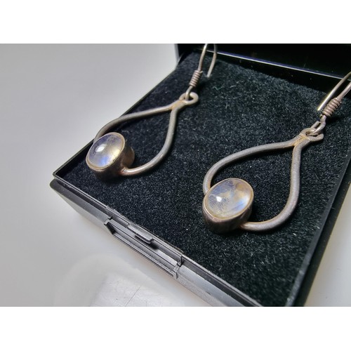 291 - 925 silver drop earrings inset with Spectrolite stones presenting blue flashing colours, marked 925.... 