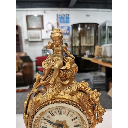 237 - Vintage french gilded Ansonia 8 day mantel clock striking on a bell for the hour and half hour, with... 