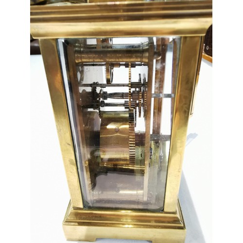 241 - Good quality early vintage brass carriage clock with a visible escapement to the top bevel edge glas... 