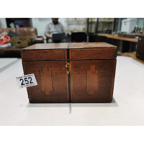 252 - Small Inlaid mahogany tea caddy with detailed inlay to top and front complete with key lock needs at... 