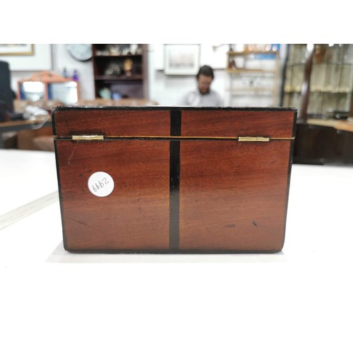 252 - Small Inlaid mahogany tea caddy with detailed inlay to top and front complete with key lock needs at... 