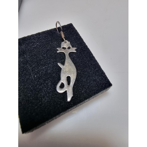 259 - A pair of 925 silver cat formed drop earrings in clean condition. Length of drop is 4cm, boxed.