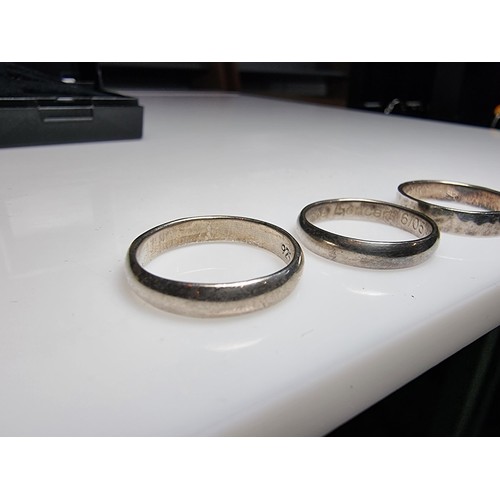 260 - A bundle of 3x 925 silver plain rings, 2 are inscribed, one with One Direction concert and the other... 